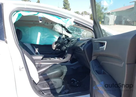 2020 Ford Edge Titanium z USA, uszkodzony, nr VIN 2FMPK4K98LBB63067